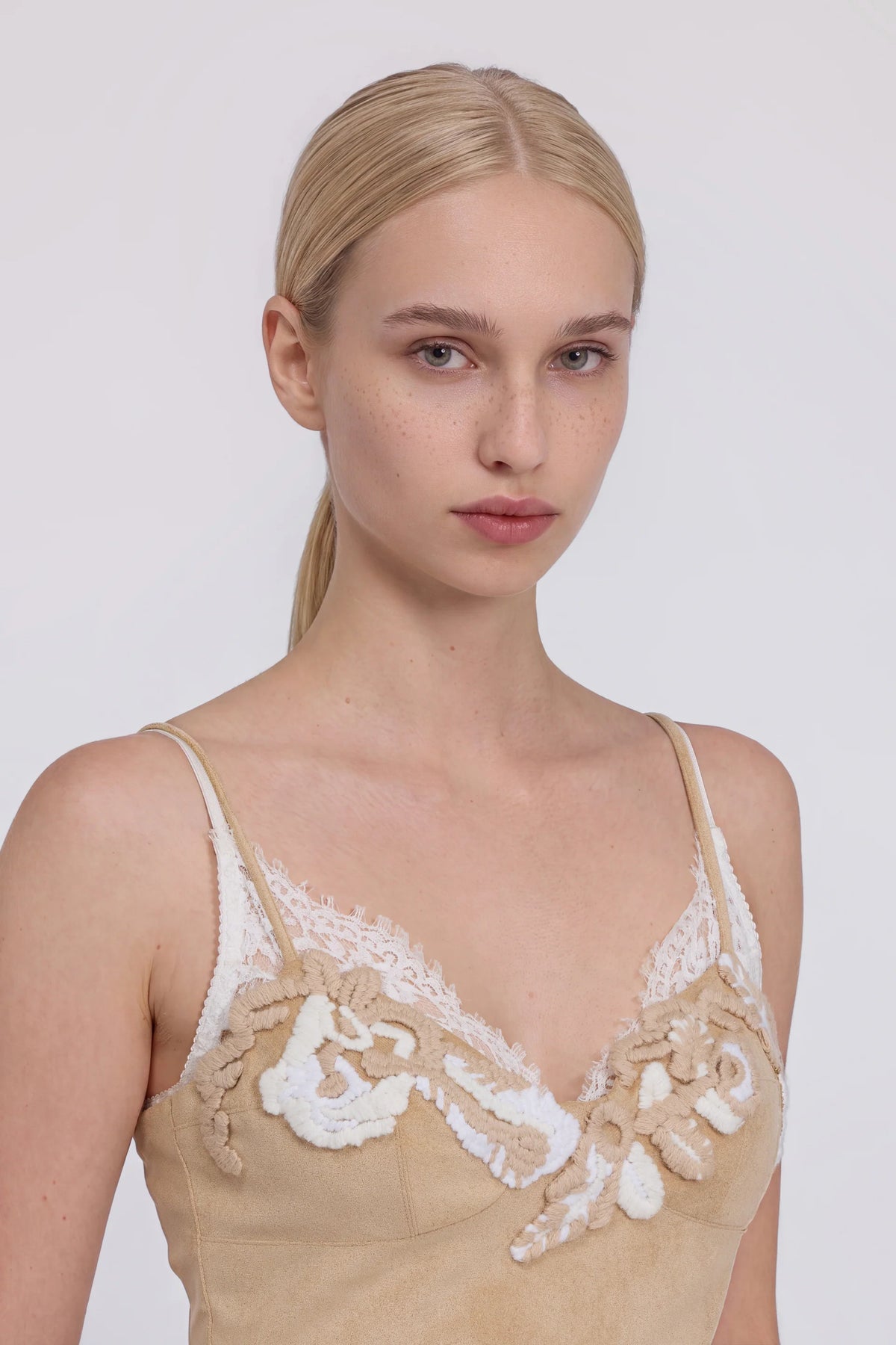 Top eco suede ricamato champagne Ermanno