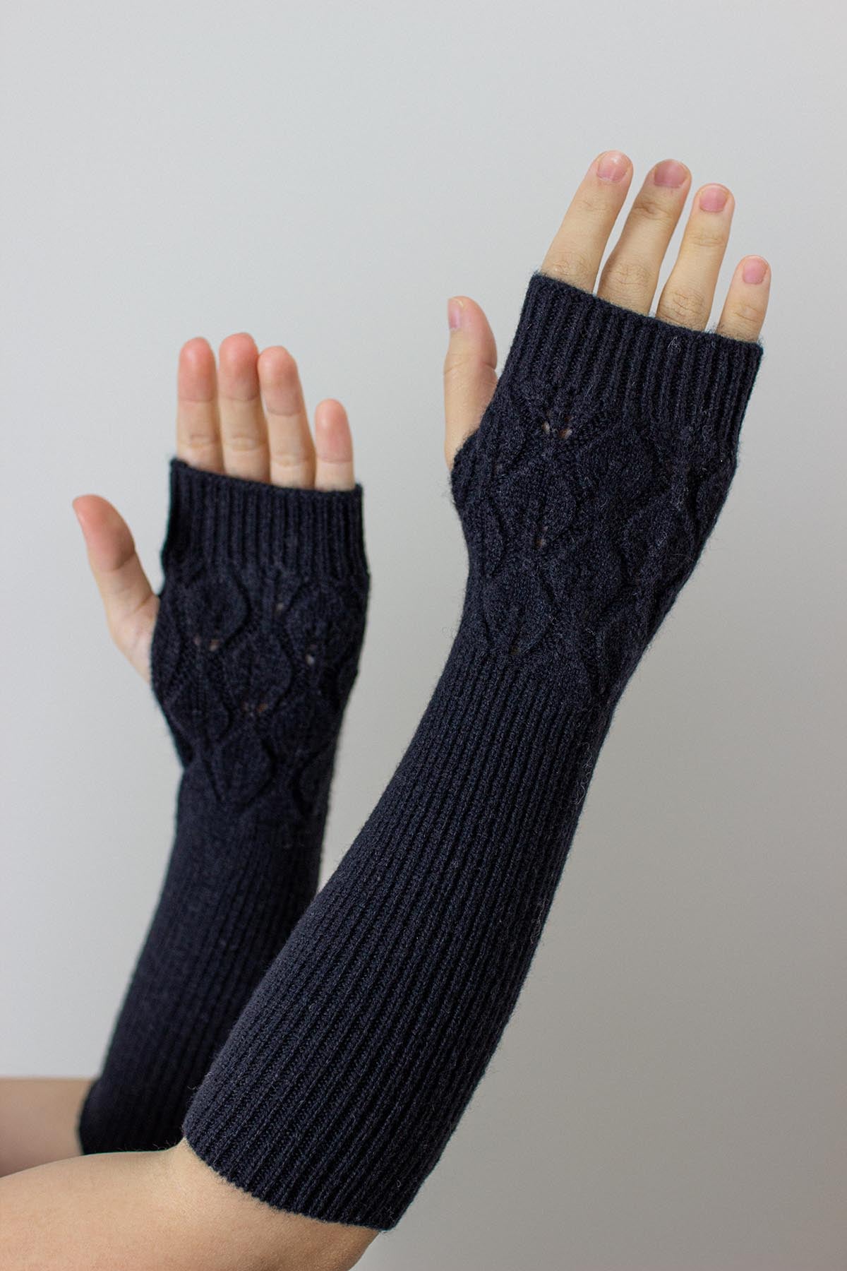 Manicotti treccia nero