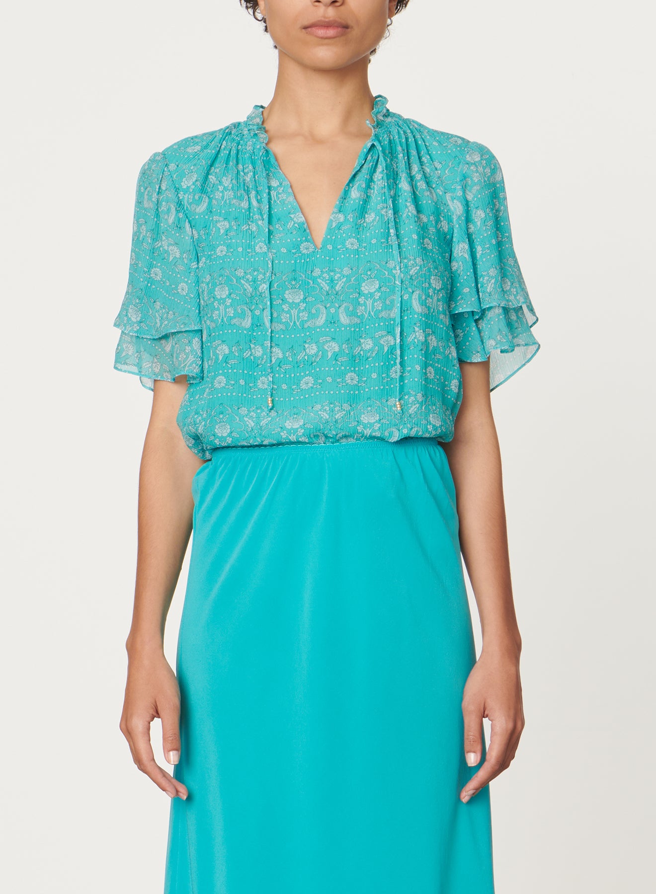 Blusa stelie micro fantasia turchese